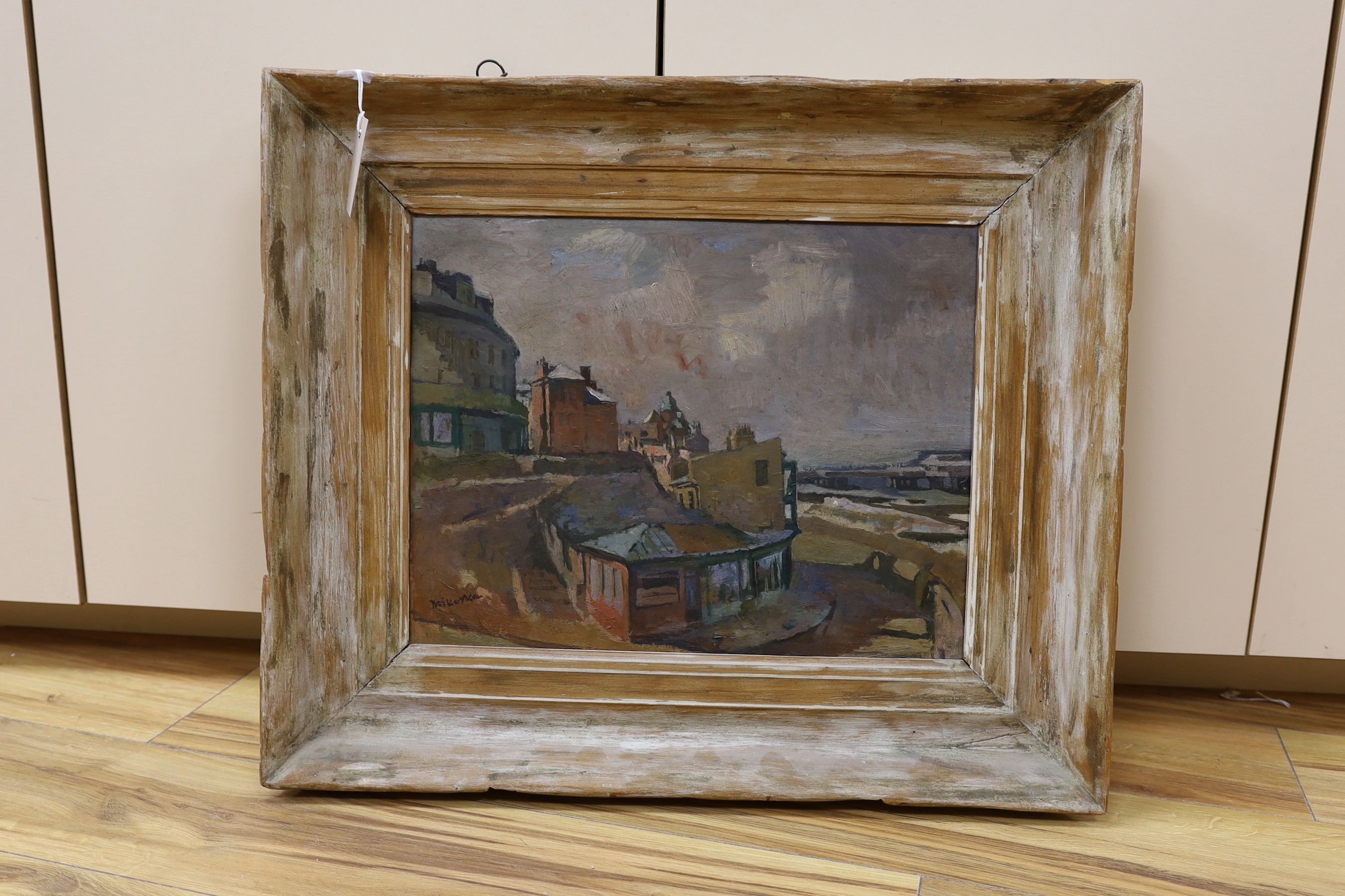 Modern British, oil on board, View of a seaside town, indistinctly signed, 33 x 42cm